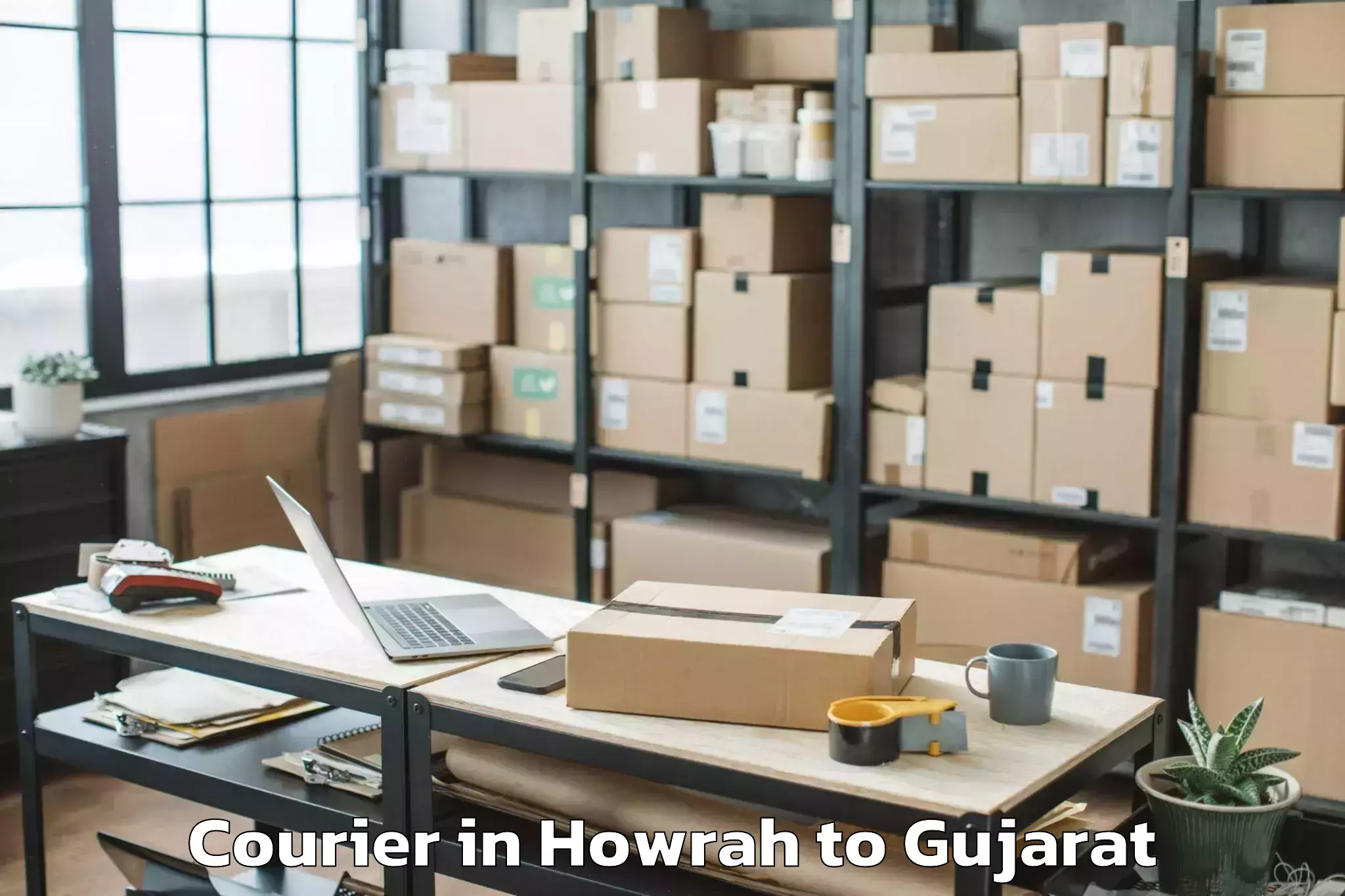 Top Howrah to Pardi Courier Available